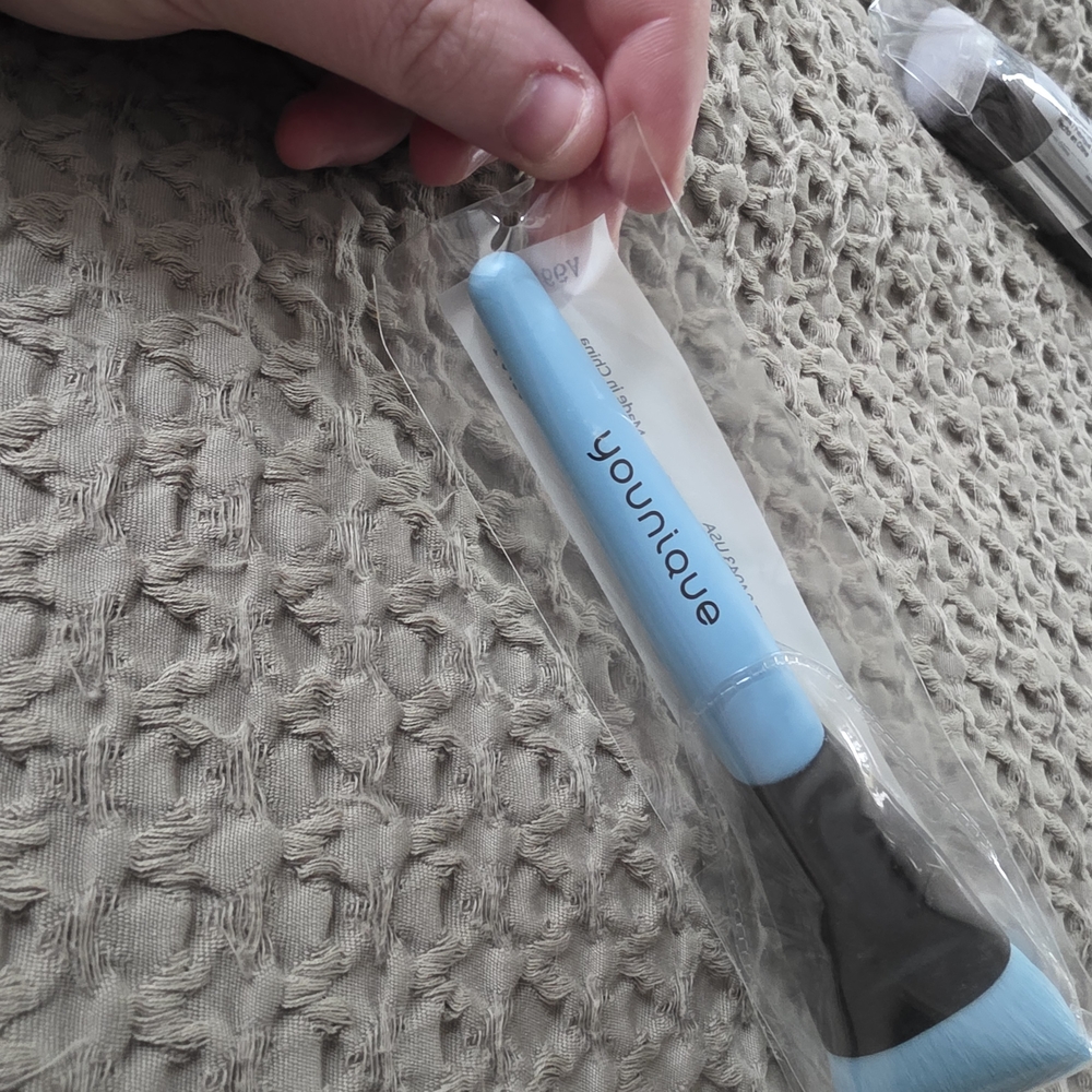 Younique Blue and Black Makeup Brush